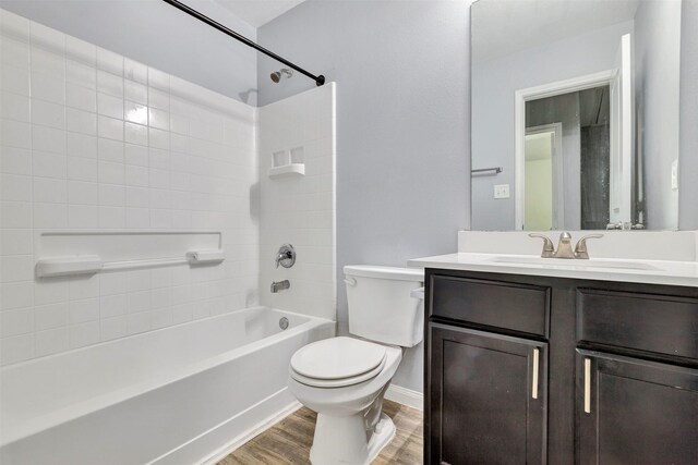 3807 Springcrest Ln, Montgomery, TX 77356 - bathroom with wood finished floors, toilet,  shower combination, vanity, and baseboards