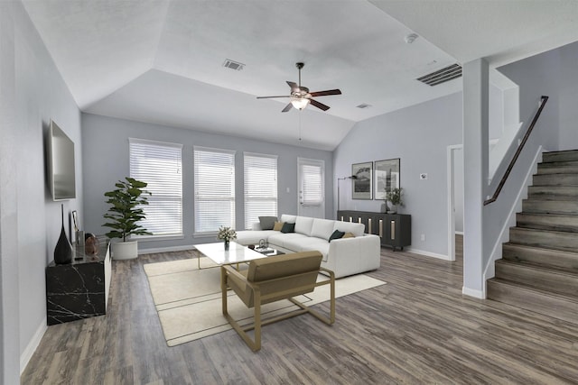 3807 Springcrest Ln, Montgomery, TX 77356 - living room featuring a ceiling fan, vaulted ceiling, wood finished floors, stairway, and baseboards