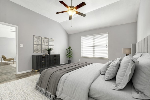 3807 Springcrest Ln, Montgomery, TX 77356 - bedroom featuring light wood-type flooring, baseboards, lofted ceiling, and ceiling fan