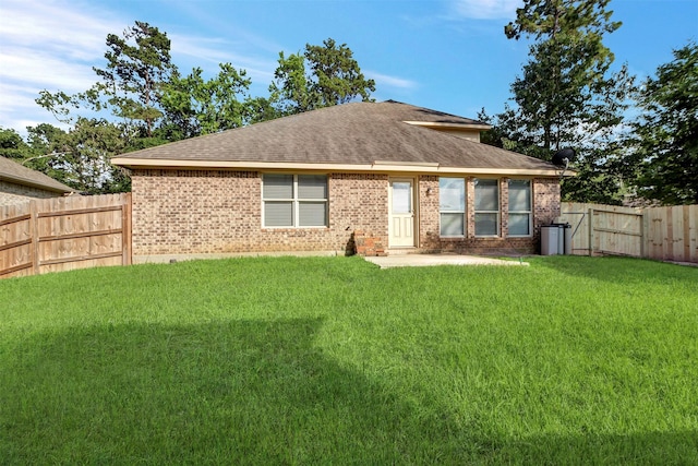 3807 Springcrest Ln, Montgomery, TX 77356 - rear view of property with brick siding, a shingled roof, and a patio