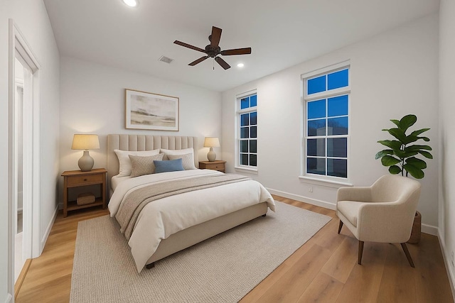 10927 Brookeshire Chase Ln, Houston, TX 77043 - bedroom with recessed lighting, baseboards, light wood finished floors, and ceiling fan