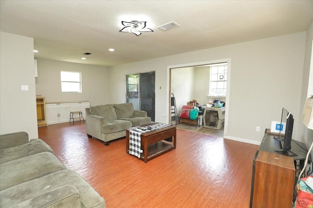 26643 Carol Ln, Splendora, TX 77372 - living area with wood finished floors, recessed lighting, and baseboards