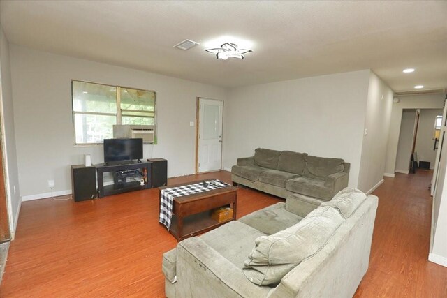 26643 Carol Ln, Splendora, TX 77372 - living room with wood finished floors, baseboards, and recessed lighting