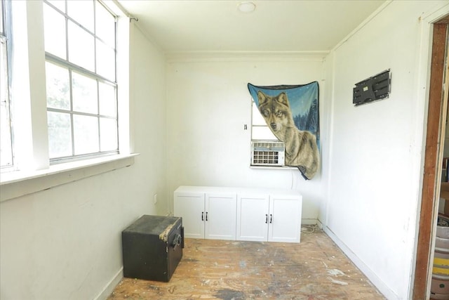 26643 Carol Ln, Splendora, TX 77372 - spare room with crown molding, cooling unit, and baseboards