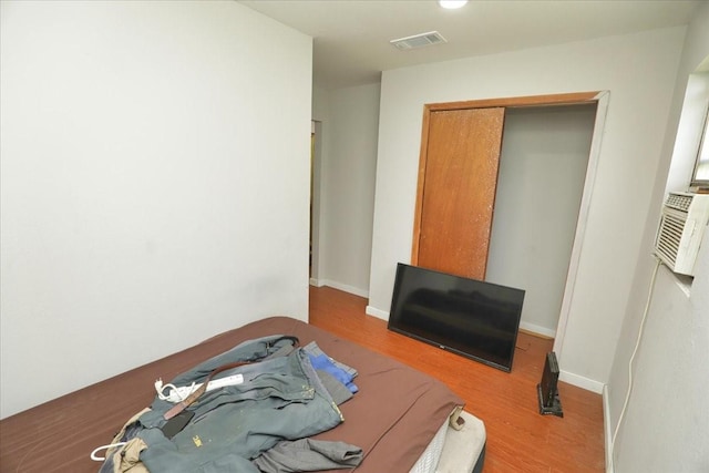 26643 Carol Ln, Splendora, TX 77372 - bedroom featuring wood finished floors and a closet