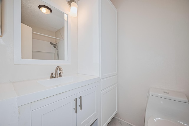 1900 Bay Area Blvd Unit 184, Houston, TX 77058 - bathroom featuring toilet and vanity