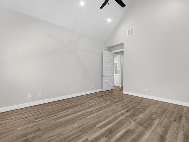 1462 Rd 66114, Dayton, TX 77535 - unfurnished room with a ceiling fan, high vaulted ceiling, baseboards, wood finished floors, and recessed lighting