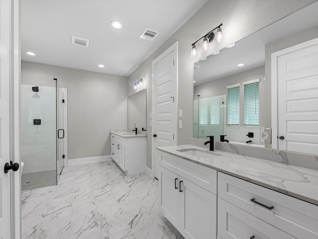 1462 Rd 66114, Dayton, TX 77535 - bathroom featuring a stall shower, recessed lighting, baseboards, two vanities, and marble finish flooring