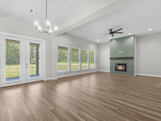 1462 Rd 66114, Dayton, TX 77535 - unfurnished living room with french doors, baseboards, wood finished floors, ceiling fan, and recessed lighting