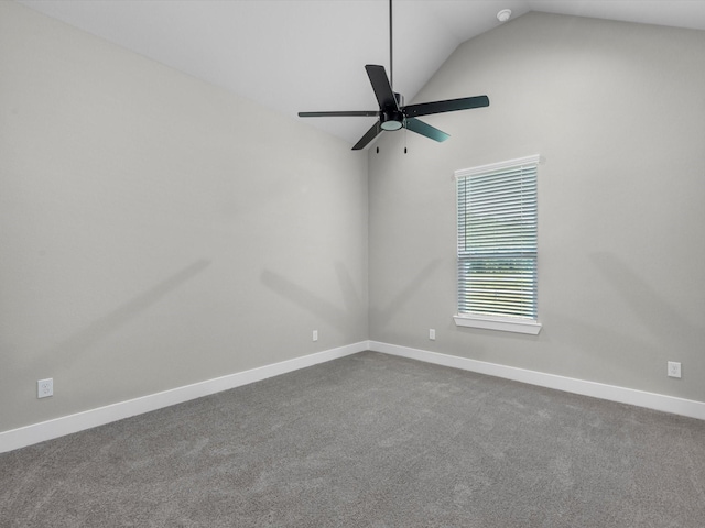 1462 Rd 66114, Dayton, TX 77535 - unfurnished room featuring vaulted ceiling, ceiling fan, dark colored carpet, and baseboards