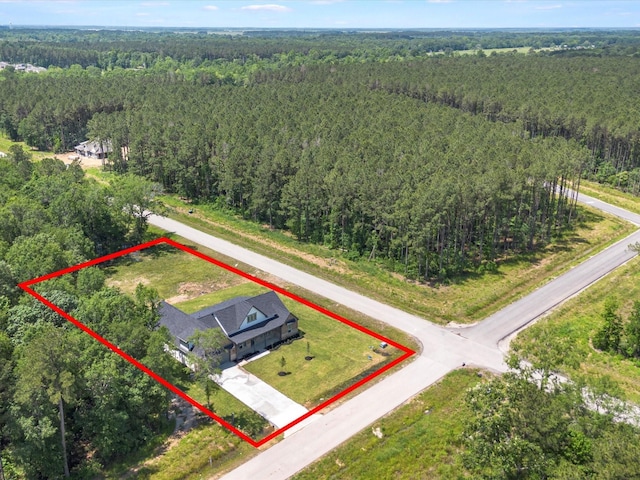 1462 Rd 66114, Dayton, TX 77535 - aerial overview of property's location with a heavily wooded area and property boundaries highlighted