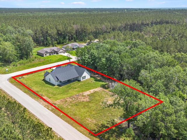 1462 Rd 66114, Dayton, TX 77535 - aerial overview of property's location featuring a heavily wooded area and property parcel outlined