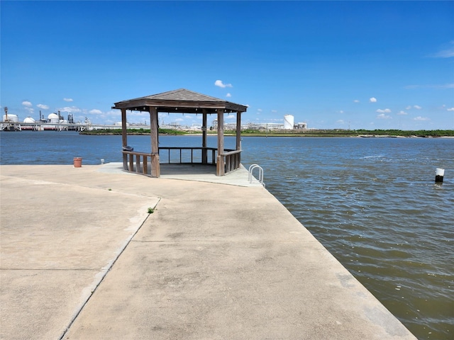 dock area featuring a gazebo and a water view
