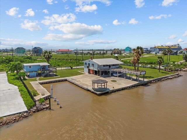 1134 Canal Dr, Surfside Beach, TX 77541 - view from above of property featuring a large body of water