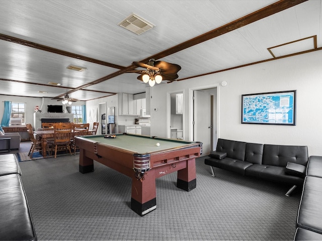 1134 Canal Dr, Surfside Beach, TX 77541 - playroom with ceiling fan, carpet flooring, billiards table, a brick fireplace, and wood ceiling