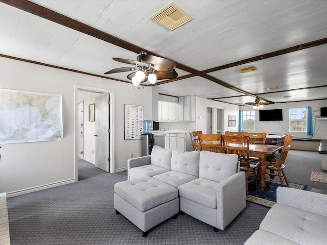 1134 Canal Dr, Surfside Beach, TX 77541 - carpeted living room featuring ceiling fan