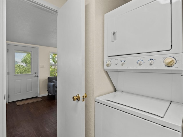 1134 Canal Dr, Surfside Beach, TX 77541 - laundry area featuring stacked washer / drying machine and dark wood-style floors