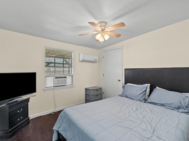 1134 Canal Dr, Surfside Beach, TX 77541 - bedroom featuring an AC wall unit, dark wood-type flooring, ceiling fan, and cooling unit