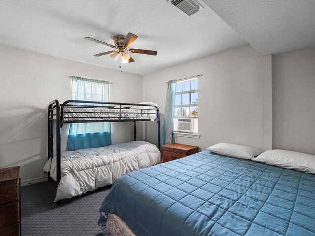 1134 Canal Dr, Surfside Beach, TX 77541 - bedroom with carpet floors, cooling unit, and a ceiling fan
