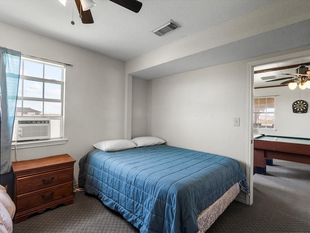 1134 Canal Dr, Surfside Beach, TX 77541 - carpeted bedroom with a ceiling fan and cooling unit