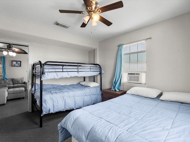1134 Canal Dr, Surfside Beach, TX 77541 - bedroom featuring carpet, cooling unit, and ceiling fan