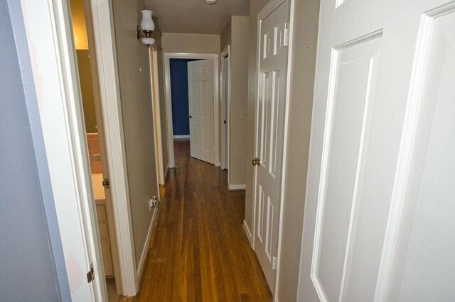 524 Oak Dr, Lake Jackson, TX 77566 - hall with wood finished floors and baseboards