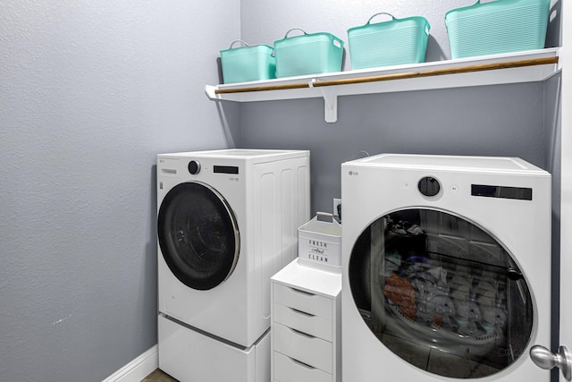 4302 Stoney Heights Ct, Spring, TX 77388 - washroom featuring independent washer and dryer and baseboards