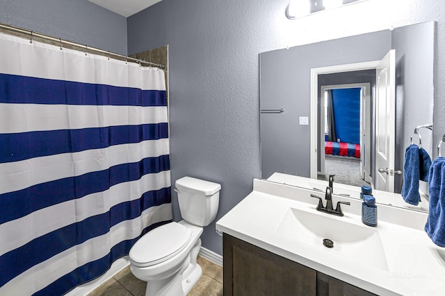 4302 Stoney Heights Ct, Spring, TX 77388 - full bath with a textured wall, toilet, tile patterned flooring, vanity, and curtained shower