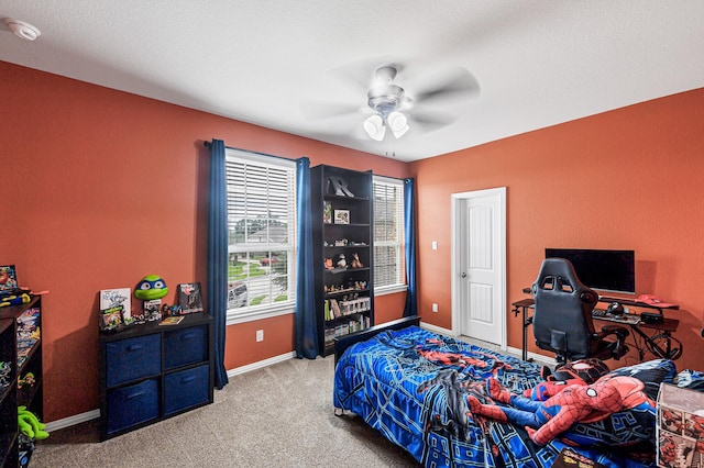 4302 Stoney Heights Ct, Spring, TX 77388 - carpeted bedroom with baseboards and a ceiling fan