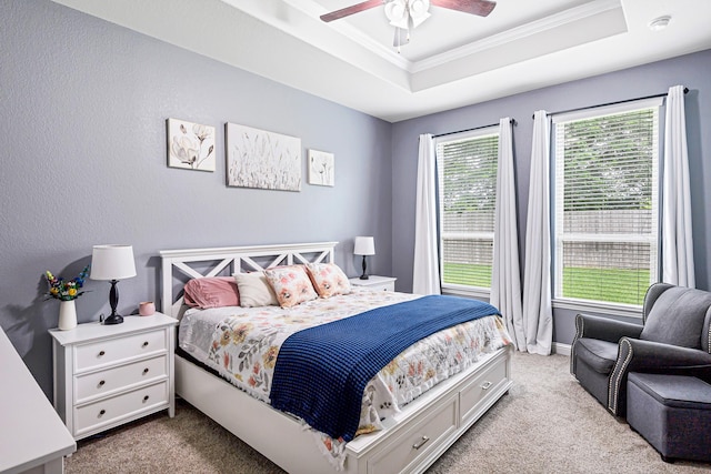4302 Stoney Heights Ct, Spring, TX 77388 - bedroom with carpet, a tray ceiling, ornamental molding, ceiling fan, and baseboards