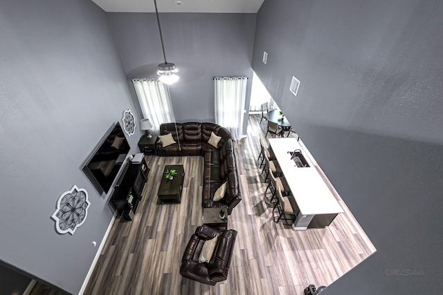 4302 Stoney Heights Ct, Spring, TX 77388 - living area with wood finished floors and a high ceiling