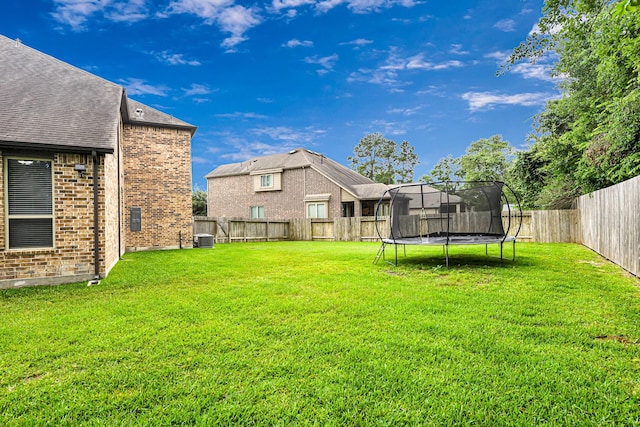4302 Stoney Heights Ct, Spring, TX 77388 - view of yard with a trampoline and central AC