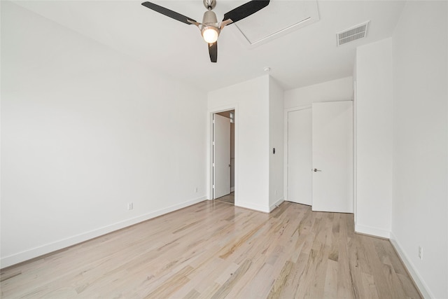 unfurnished bedroom with light wood-type flooring, baseboards, and a ceiling fan