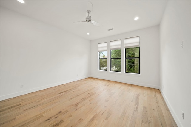 empty room featuring recessed lighting, light wood-type flooring, baseboards, and ceiling fan