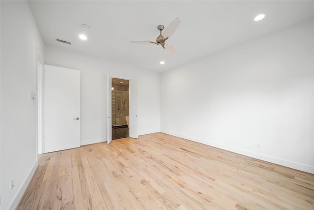 spare room with a ceiling fan, light wood-style floors, recessed lighting, and baseboards