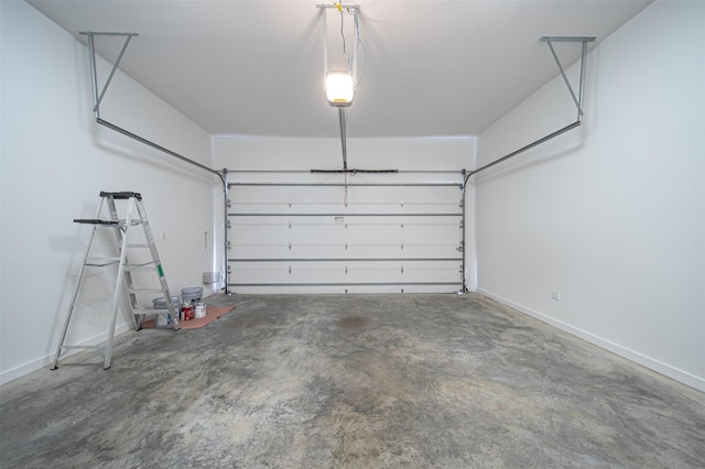 garage featuring baseboards