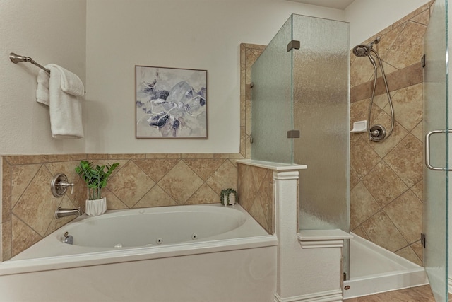71 Ginger Jar St, The Woodlands, TX 77382 - bathroom with a shower stall and a jetted tub