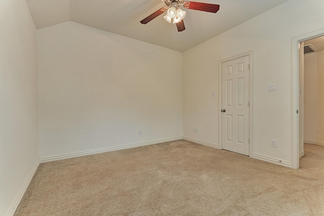 71 Ginger Jar St, The Woodlands, TX 77382 - spare room featuring carpet flooring, a ceiling fan, vaulted ceiling, and baseboards