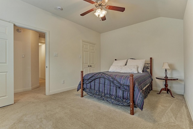 71 Ginger Jar St, The Woodlands, TX 77382 - carpeted bedroom with baseboards, vaulted ceiling, and ceiling fan