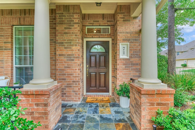 71 Ginger Jar St, The Woodlands, TX 77382 - entrance to property featuring brick siding and covered porch