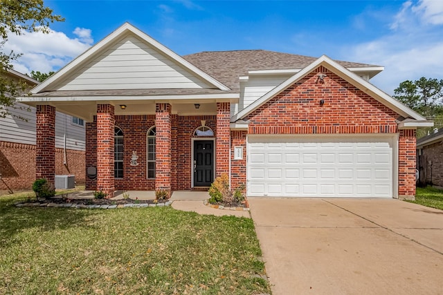 18314 Madisons Crossing Ln, Tomball, TX 77375 - view of front of property with brick siding, a front lawn, driveway, an attached garage, and cooling unit