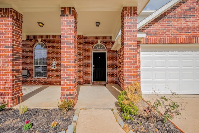 18314 Madisons Crossing Ln, Tomball, TX 77375 - doorway to property featuring brick siding and a garage