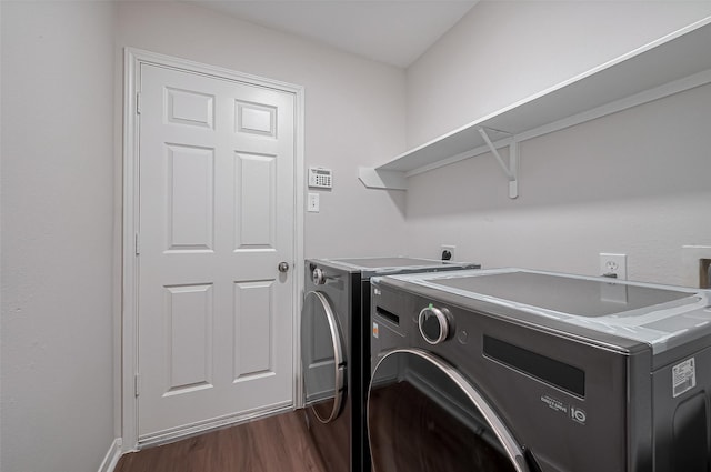 18314 Madisons Crossing Ln, Tomball, TX 77375 - laundry area with washing machine and clothes dryer and dark wood-type flooring