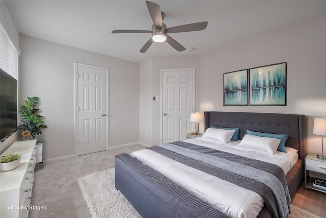 18314 Madisons Crossing Ln, Tomball, TX 77375 - bedroom with baseboards, light colored carpet, and ceiling fan
