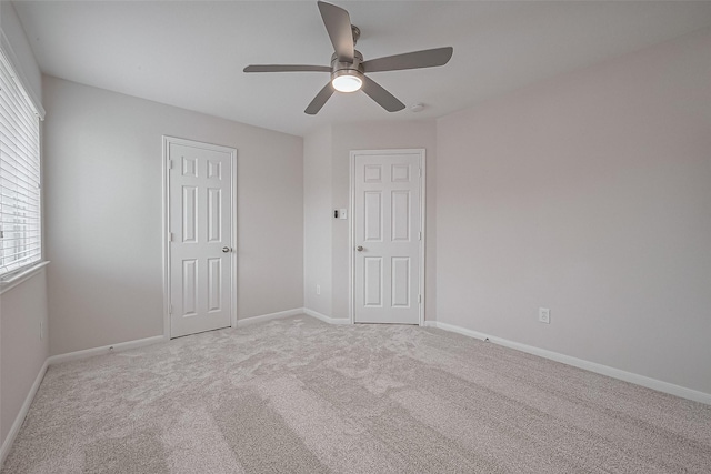 18314 Madisons Crossing Ln, Tomball, TX 77375 - unfurnished bedroom featuring carpet, baseboards, and a ceiling fan