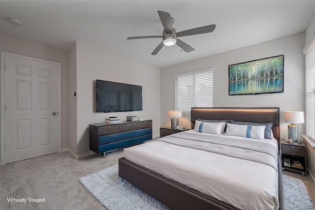 18314 Madisons Crossing Ln, Tomball, TX 77375 - carpeted bedroom featuring baseboards and a ceiling fan