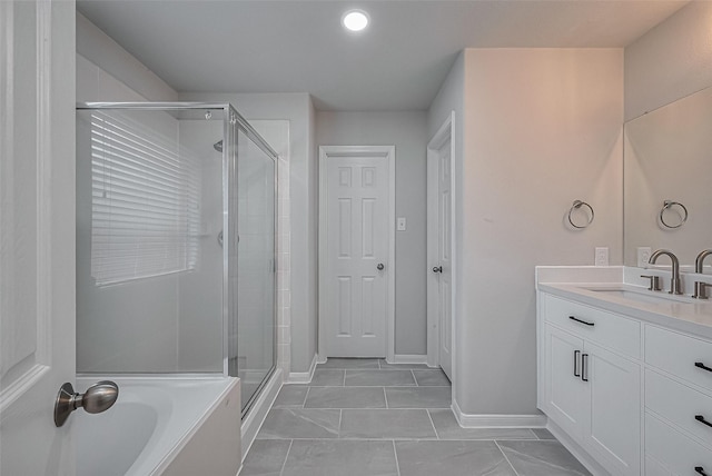 18314 Madisons Crossing Ln, Tomball, TX 77375 - full bath with a shower stall, vanity, baseboards, a bath, and recessed lighting