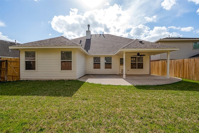 18314 Madisons Crossing Ln, Tomball, TX 77375 - rear view of house with a patio, roof with shingles, and a chimney