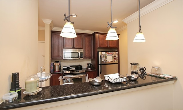 kitchen featuring appliances with stainless steel finishes, ornamental molding, a peninsula, pendant lighting, and dark stone counters