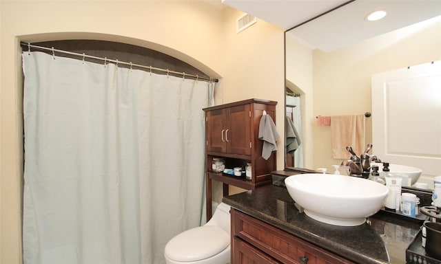 full bathroom with vanity, recessed lighting, toilet, and a shower with shower curtain